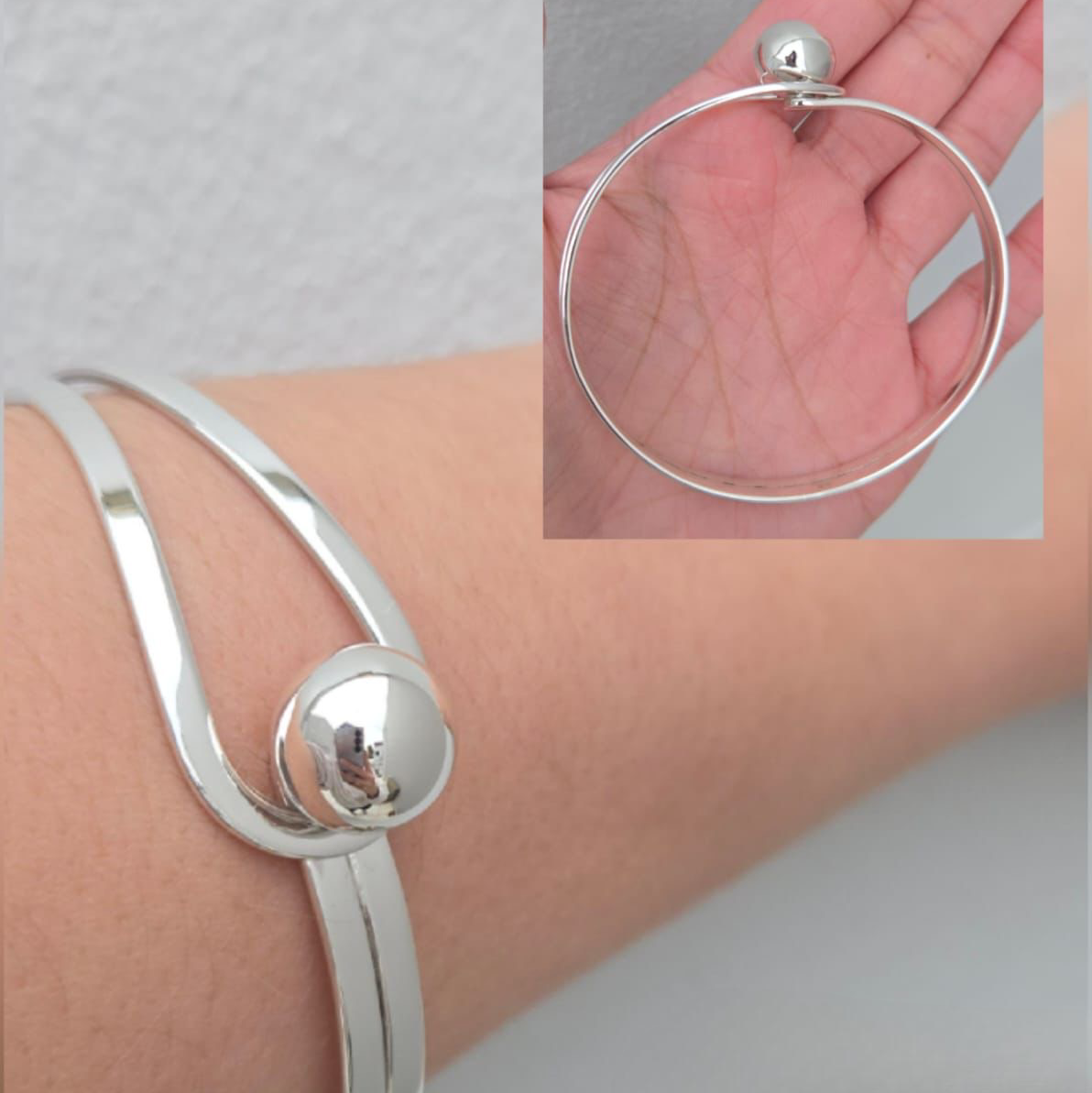 Silver bracelet on wrist with close-up inset