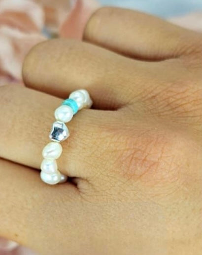 Tiny freshwater pearls on elastic ring