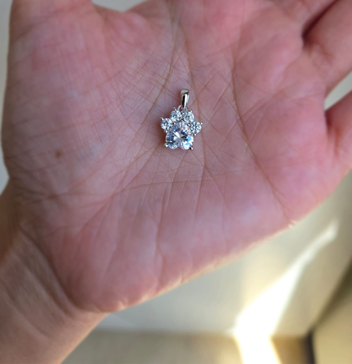 Stunning animal paw pendant