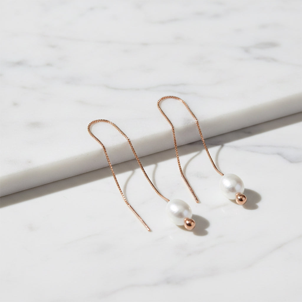 Rose gold thread shoe lace earrings with pearl on end