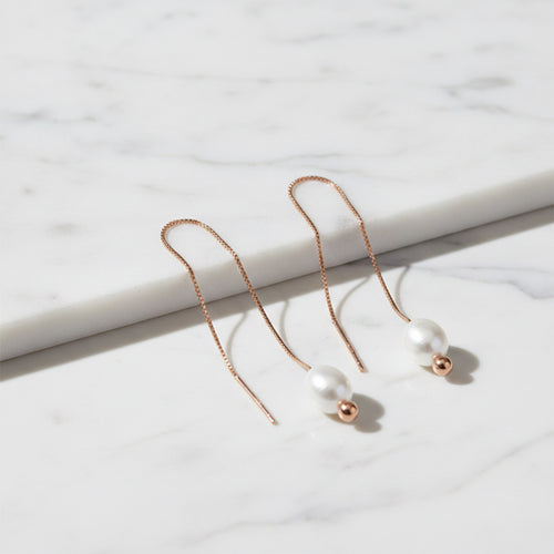 Rose gold thread shoe lace earrings with pearl on end