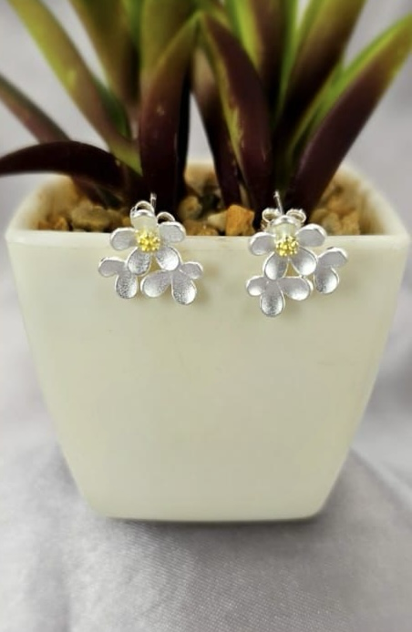 Three flower stud earrings