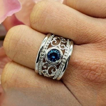 Sterling Silver Filigree Ring with Round Blue Cubic Zirconia Stone