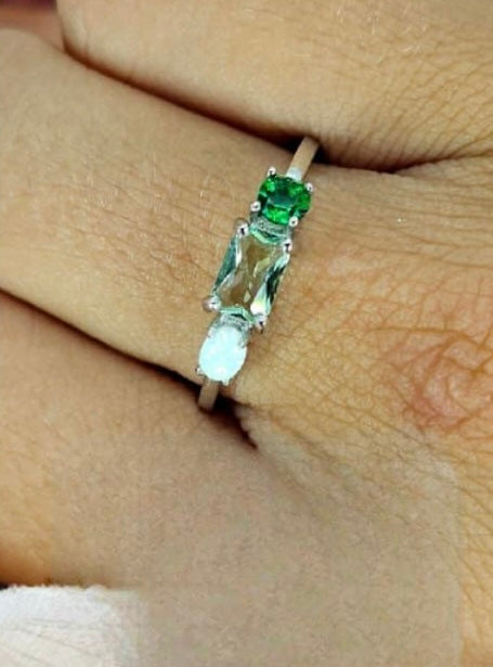 Sterling silver ring with green and opal cubic zirconia