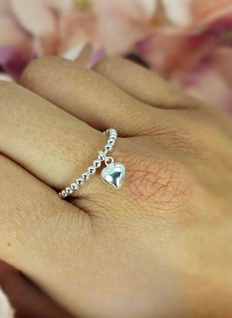 Sterling silver bobble ring with dangling puffy heart