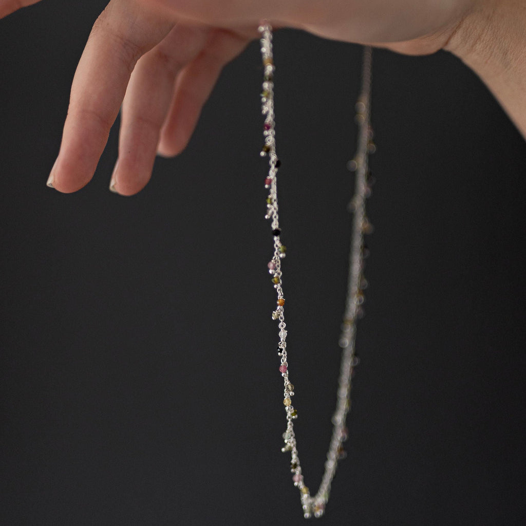 Sterling Silver Necklace With Lots Of Tourmaline Semi Precious Stones Dangling On It