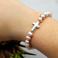 7 Blush Freshwater Pearls On Elastic Band With Sterling Silver Cross - Terciany 