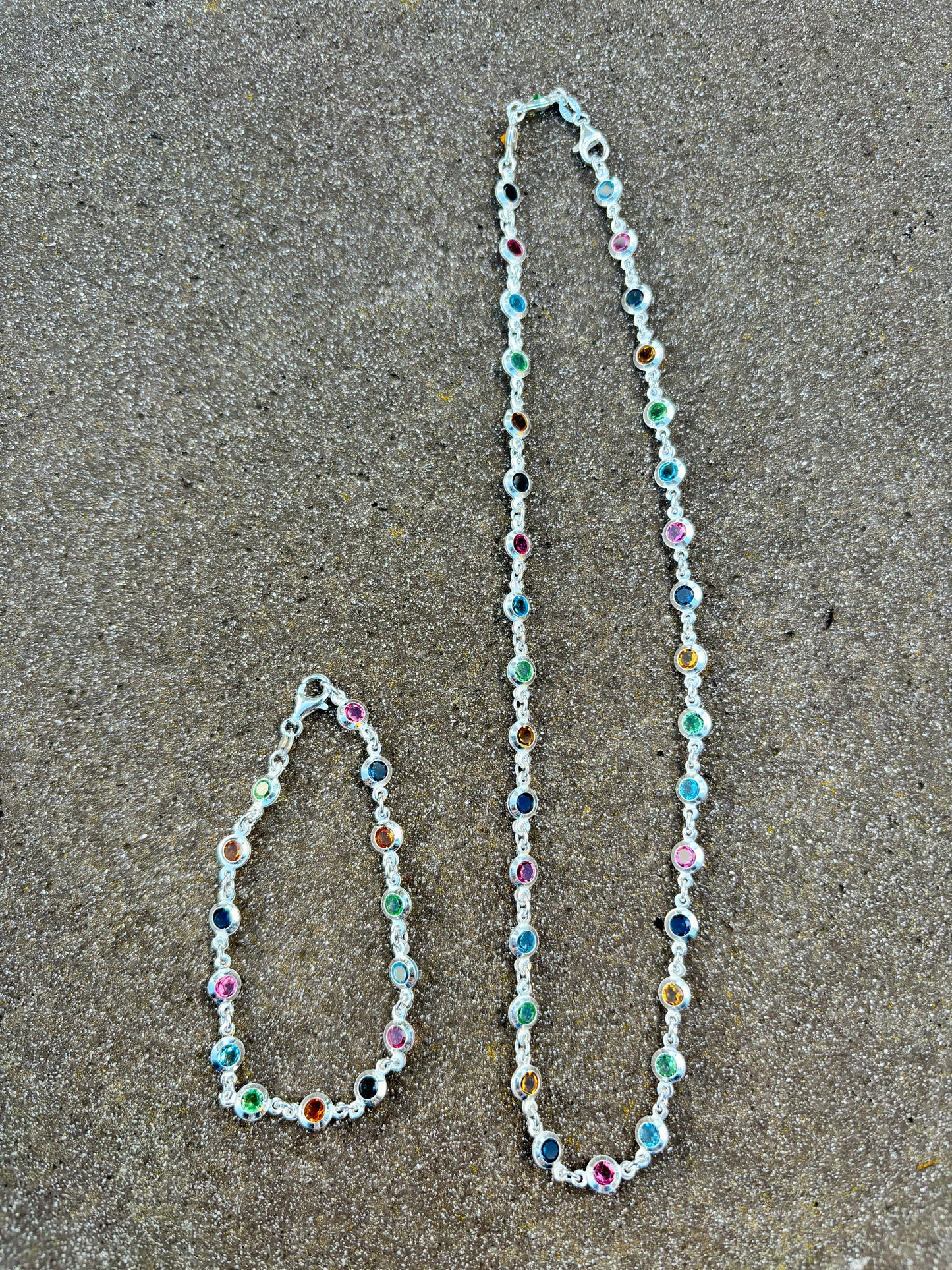 Sterling silver necklace with rainbow coloured cubic zirconia