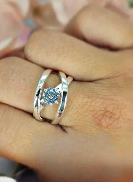 Stelring Silver Ring With Cross Over Band And Stunning Cubic Zirconia