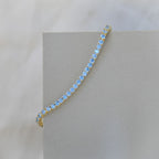 Gold tennis bracelet with blue zirconia stones - Terciany 