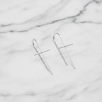 Solid cross drop earrings