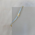 Gold tennis bracelet with blue zirconia stones - Terciany 