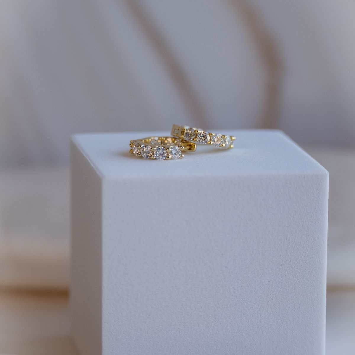 Gold 15mm Huggy earrings with Moissanite Stones(with GRA Certificate)