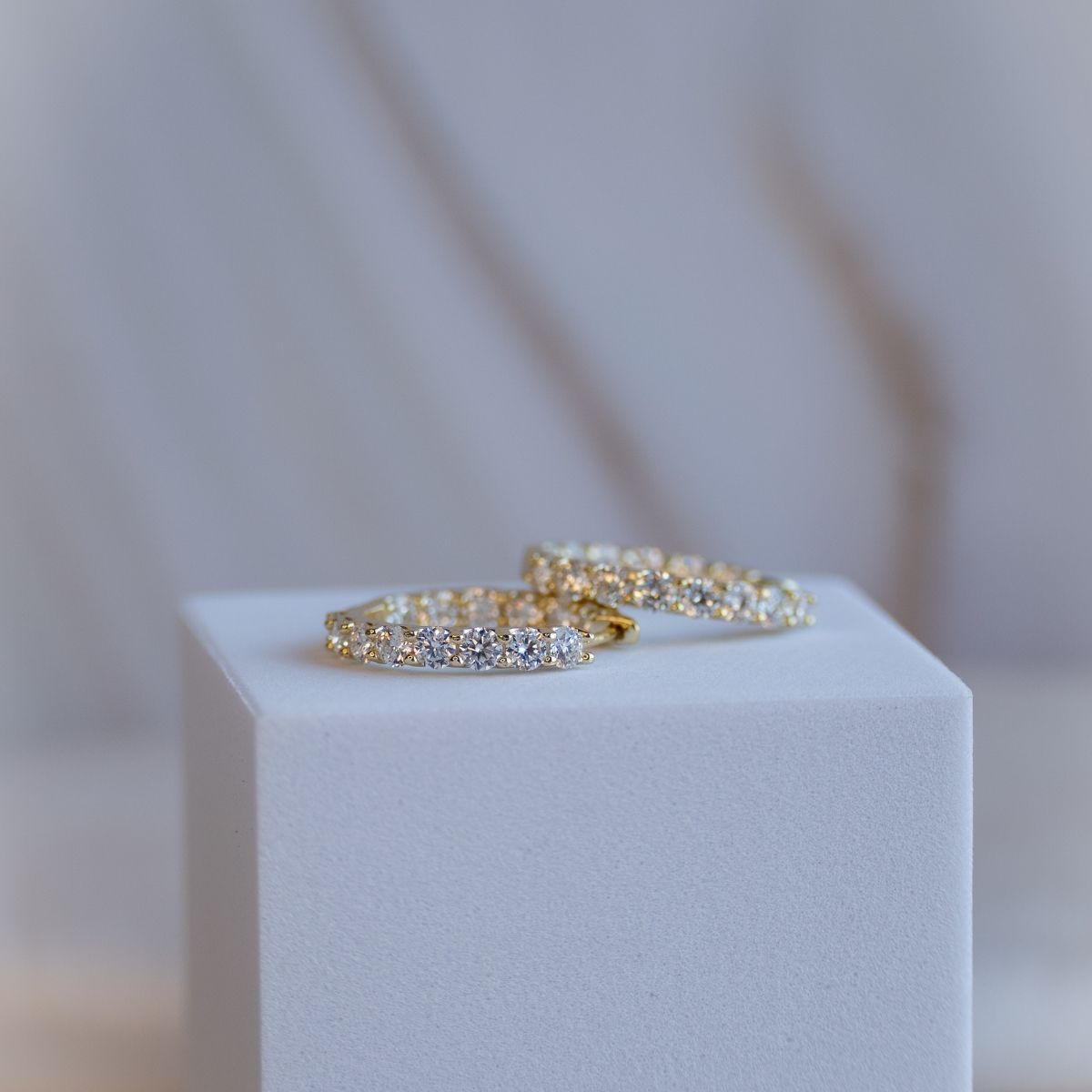 Gold 22mm Huggy earrings with Moissanite stones (with GRA Certificate)