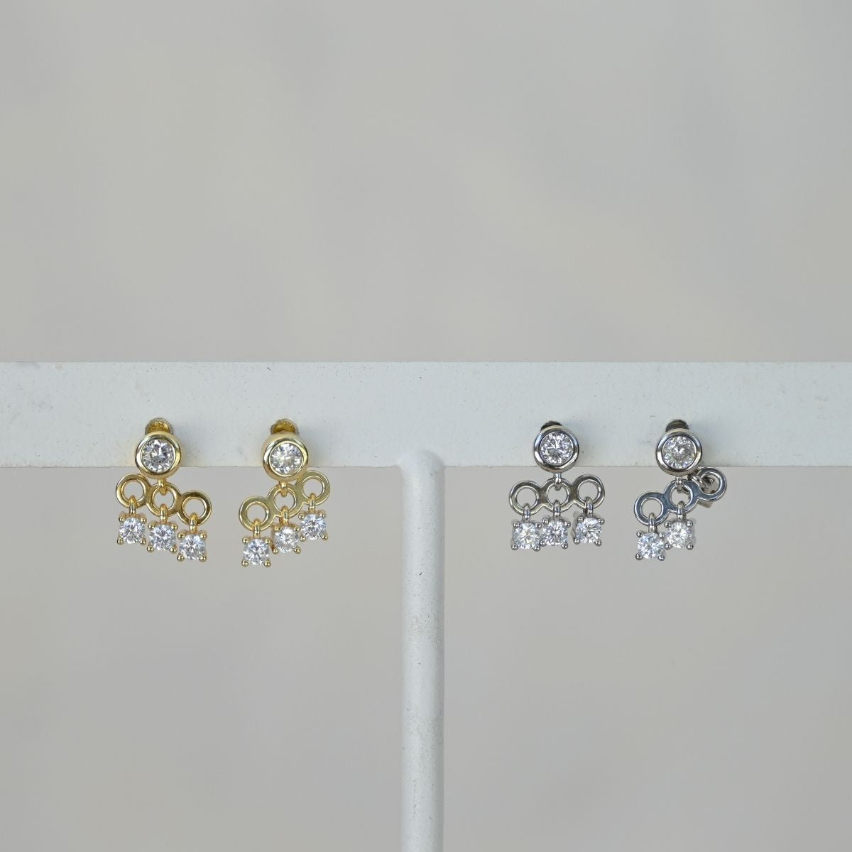 Gold dangly drop stud earrings