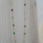 Gold Necklace With Different Coloured Semi Precious Stones In Necklace