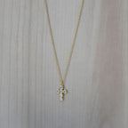 Gold cross necklace with clear zirconia stones