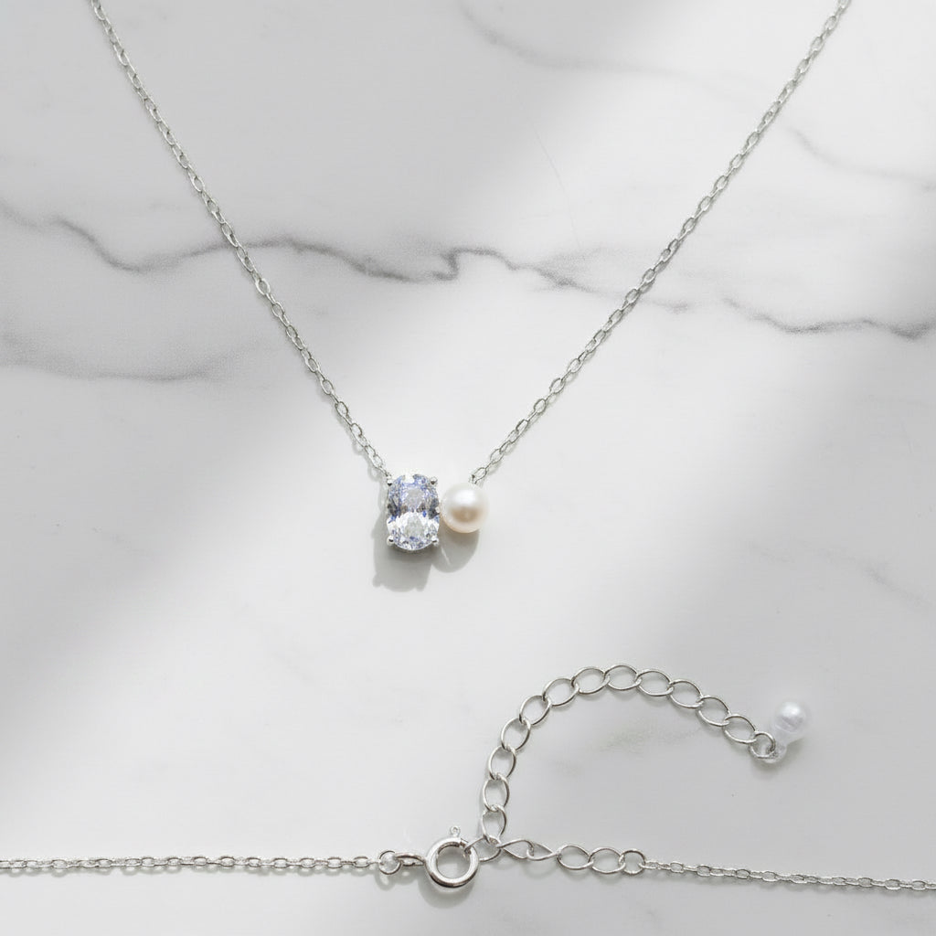 Oval Clear stone and freshwater pearl drop necklace