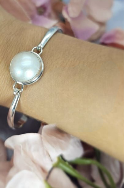 Sterling silver 63mm bangle with clasp and 16mm white Mabe pearl
