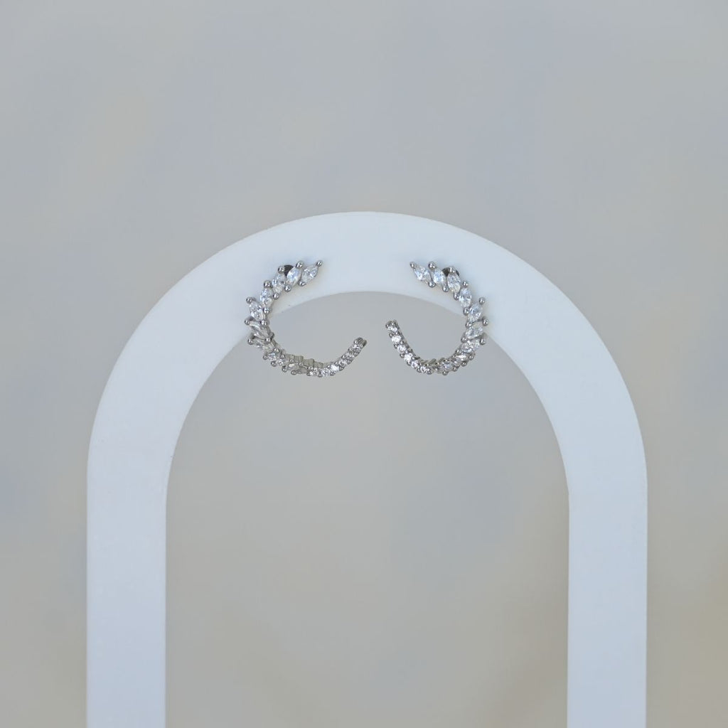 Wrapped around stud earrings with clear zirconia