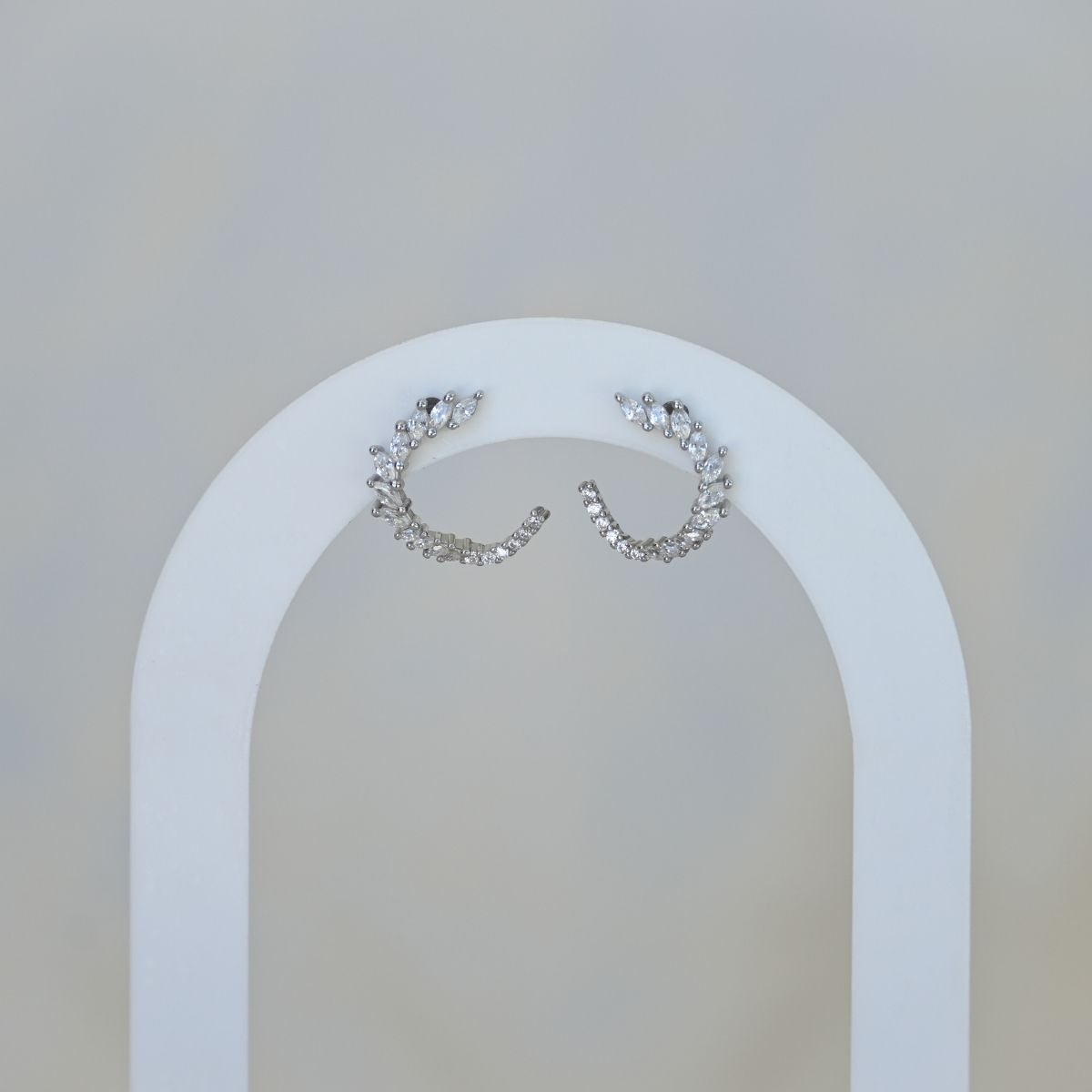 Wrapped around stud earrings with clear zirconia