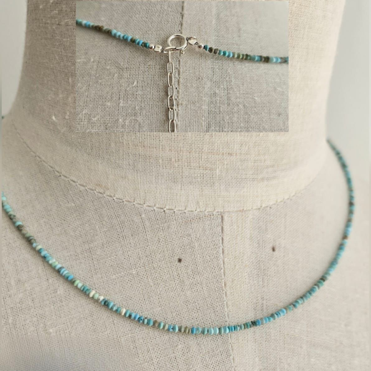 Necklace with blue beads on a mannequin bust