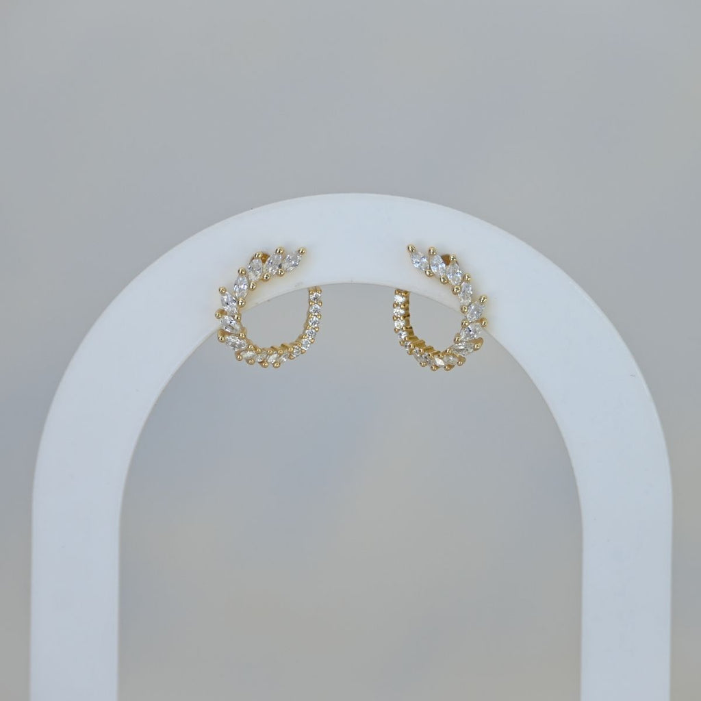 Gold wrap around stud earrings with zirconia stones