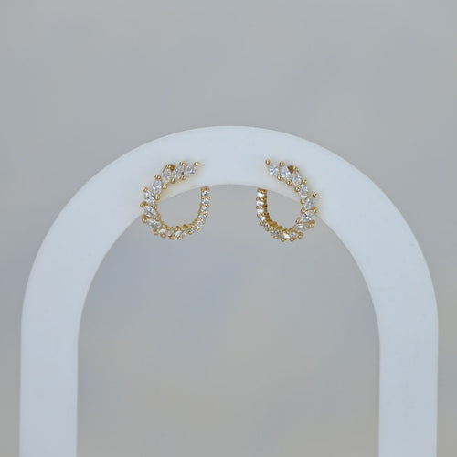 Gold wrap around stud earrings with zirconia stones