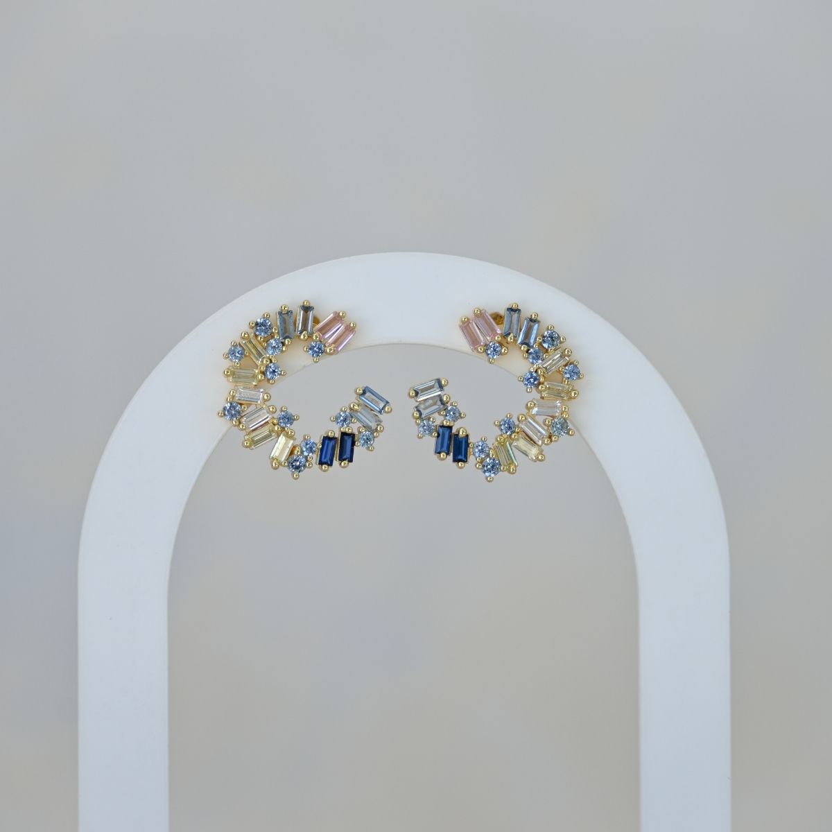 C shaped stud earrings with pastel coloured zirconia stones