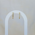 Gold paperclip shaped huggy earrings