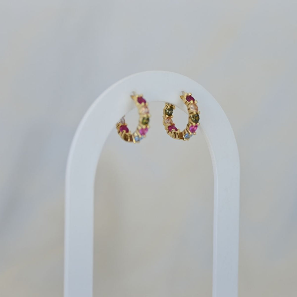 Five coloured zirconia gold huggy earrings