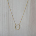 Gold circle necklace