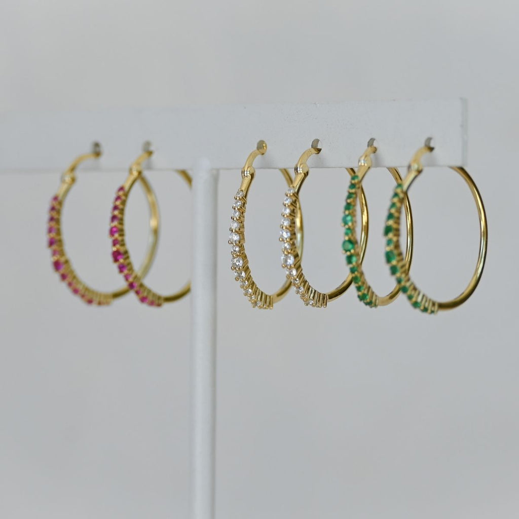 Gold hoop earrings with clear zirconia stones