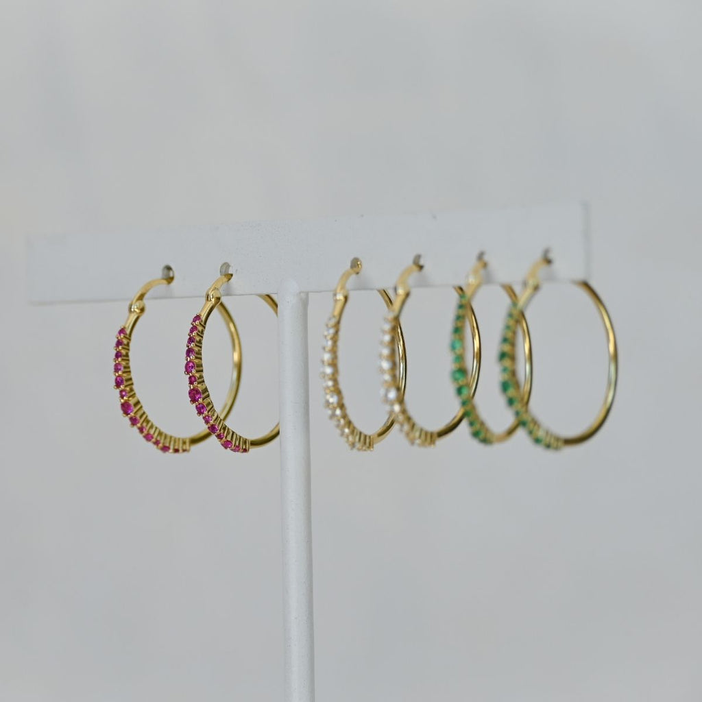 Gold hoops with ruby zirconia stones