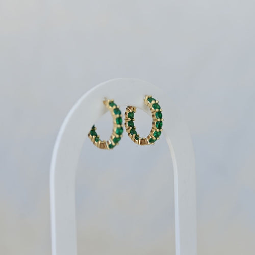 Gold Huggys with green zirconia stones