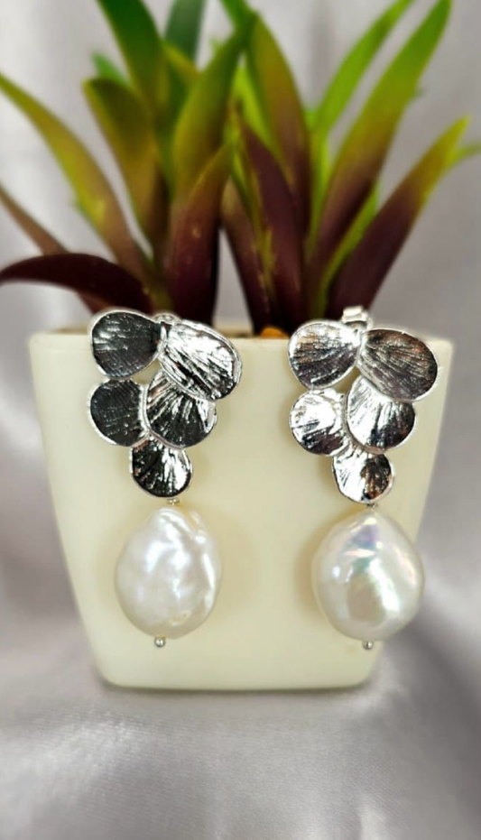 Silver flower setting for stunning pearl earrings