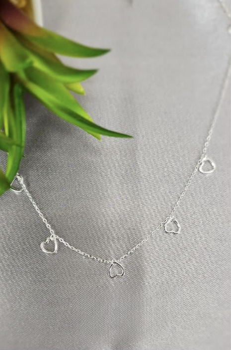 Sterling silver necklace with lots of tiny open hearts