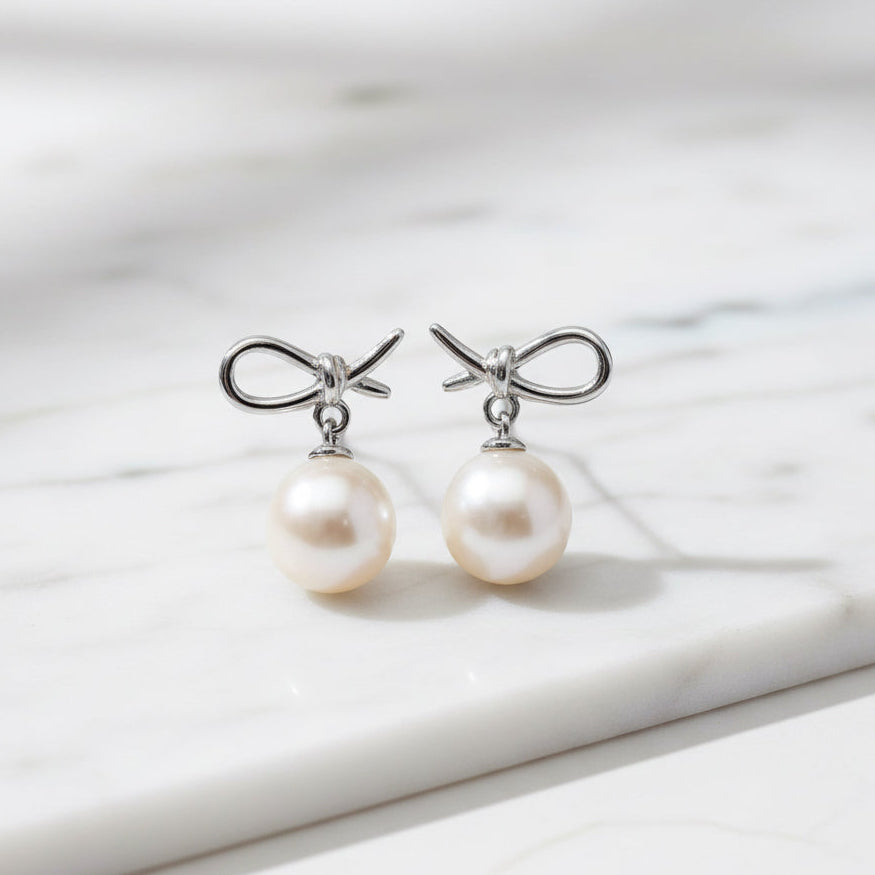 Pearl bow earrings