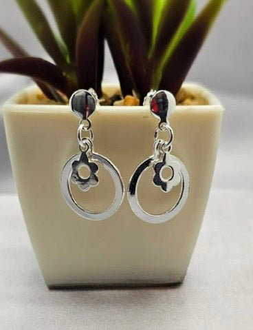 Sterling silver flower in circle earring