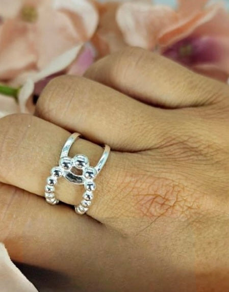 Sterling silver open ring knot design