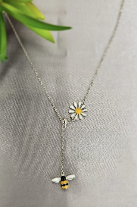 Sterling silver V shape necklace with daisy flower and bee
