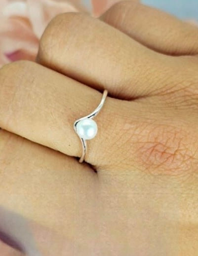 Sterling silver adjustable wishbone ring with freshwater pearl centre