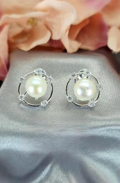 Circle stud with cubic zirconia dots and 16mm freshwater pearl inner