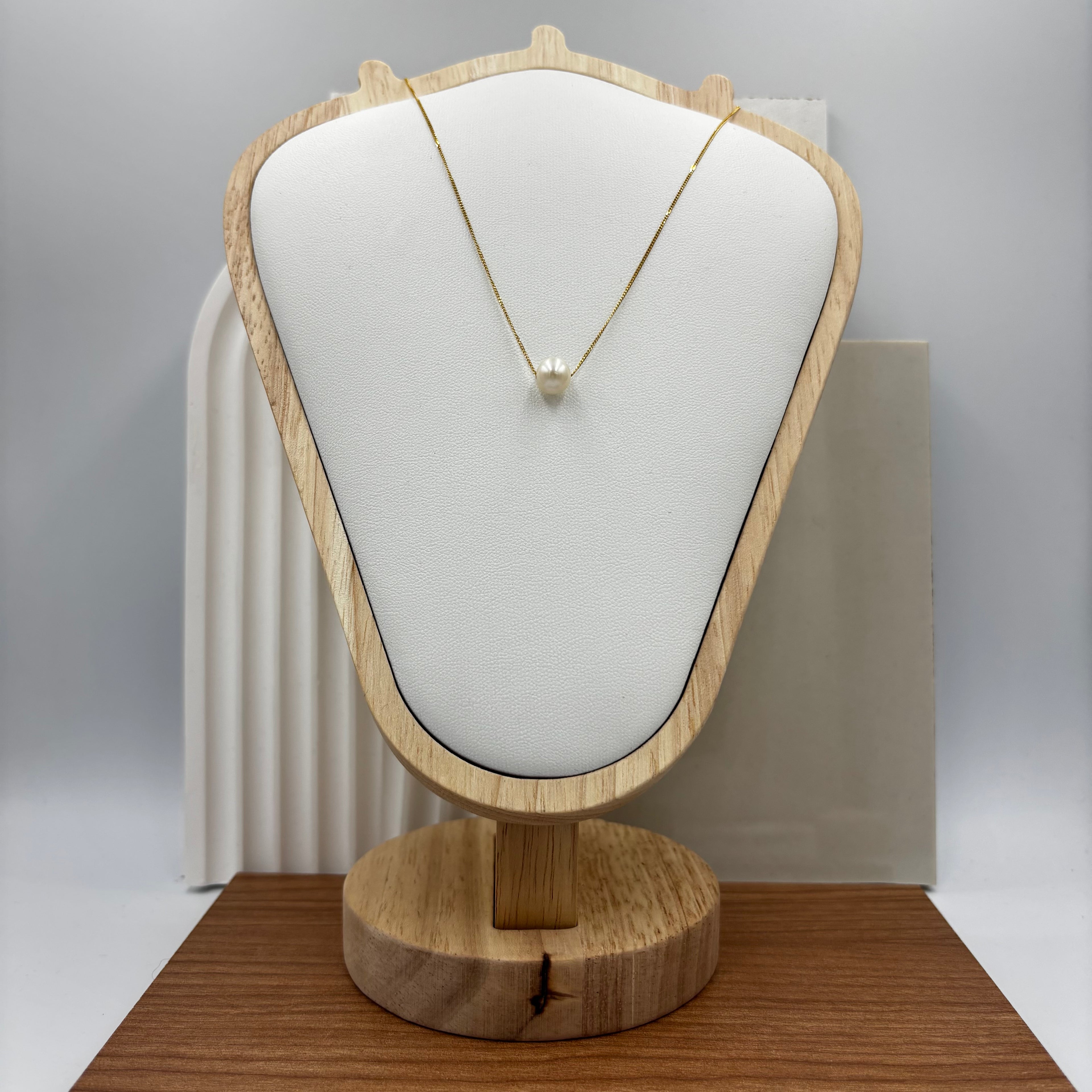 Gold necklace with freshwater pearl slider