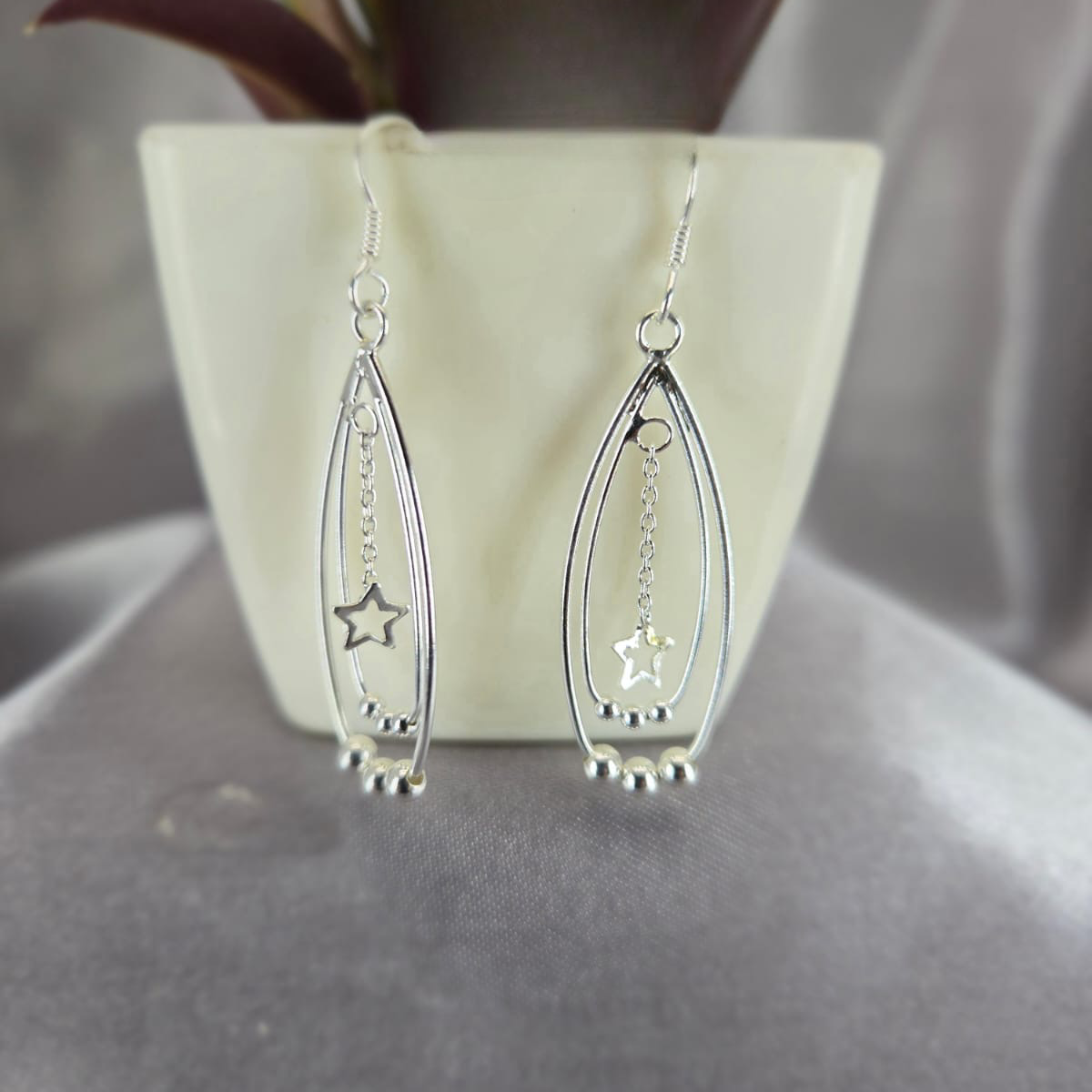 Double Oval Drops With A Little Star In Centre And Ball Detail