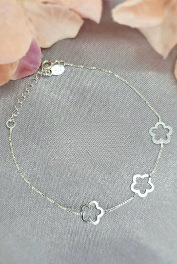 Sterling silver bracelet with three flower detail