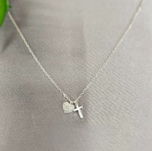 Necklace with cross and bling heart