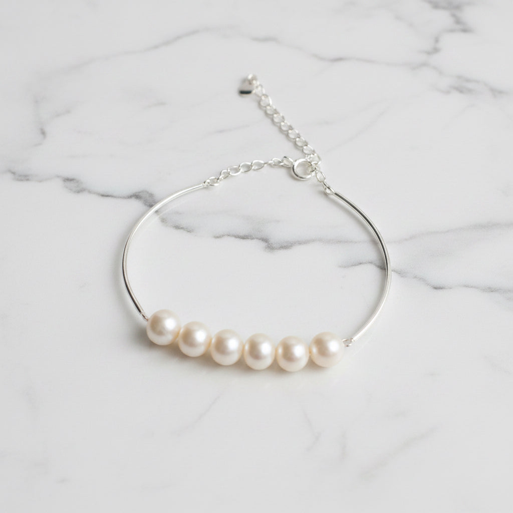 7 mm Freshwater Pearls Bracelet With Sterling Silver Setting And Clasp