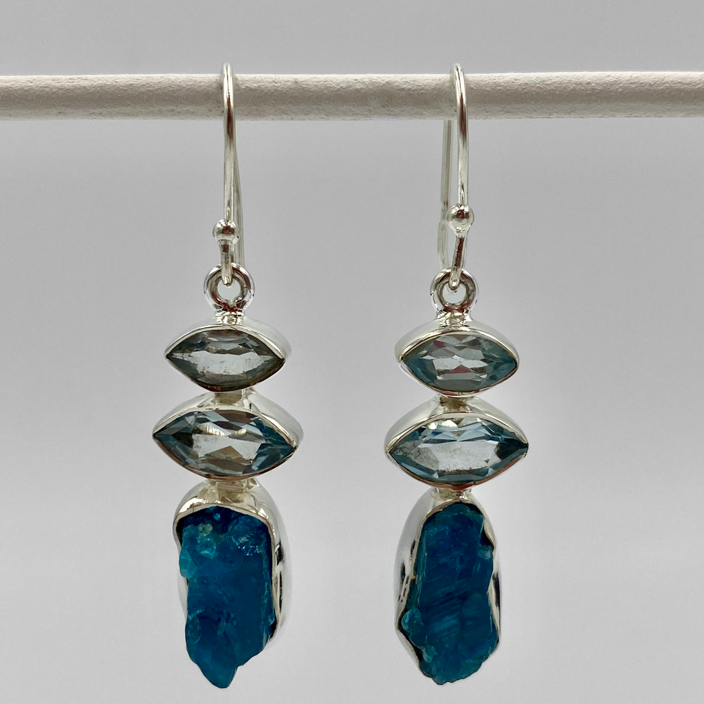A pair of sterling silver drop earrings with mixed semi-precious stone accents.