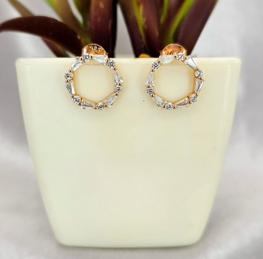 Rosé gold circle studs decorated with baguette cubic zirconia